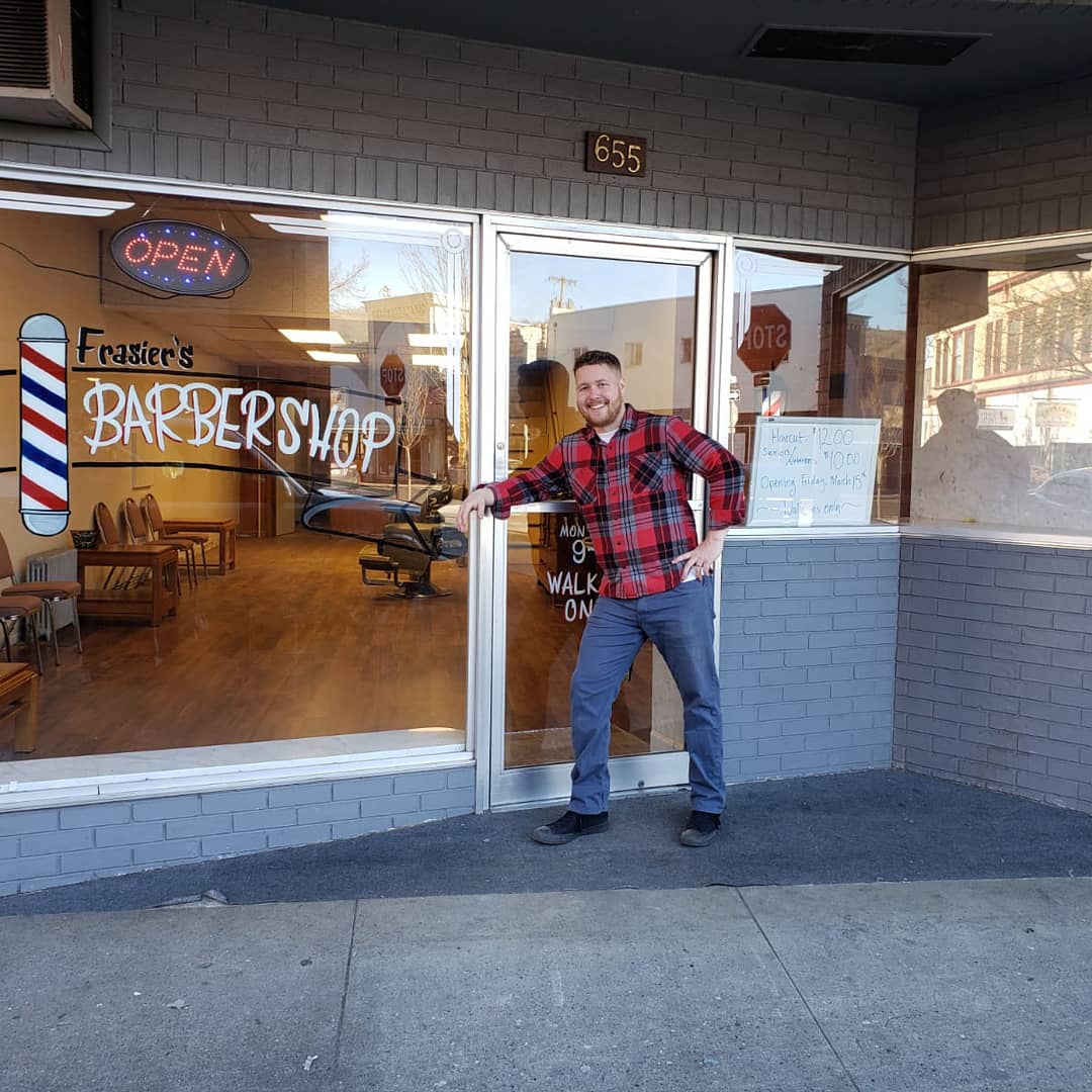 Frasier's Barbershop storefront with hand-painted window